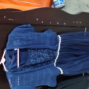 My kids party dress it's blue the size is 10